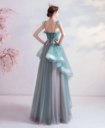 blue and green gown