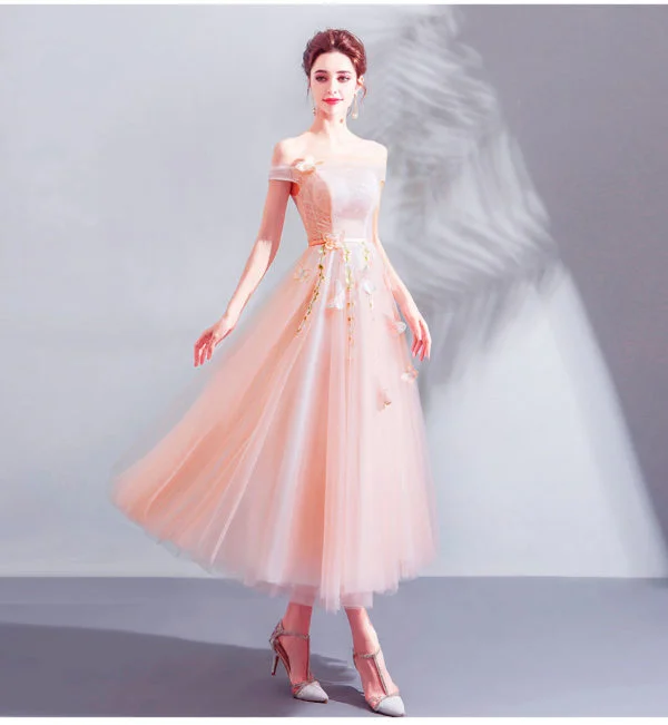 Elegant blush ballerina length wedding dress with 3/4 sleeves